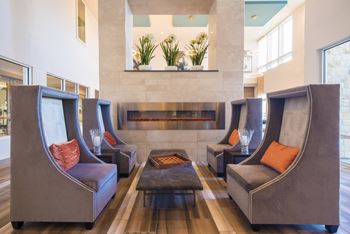 Indoor Fireside Lounge at Parc at White Rock Luxury Apartments in Dallas, TX
